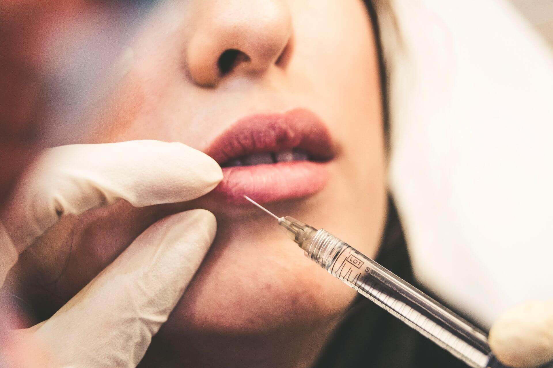 woman receiving botox injection