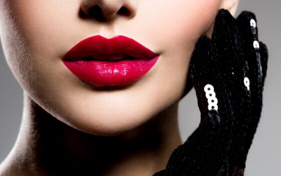 lose up women s lips with red lipstick black gloves cheek