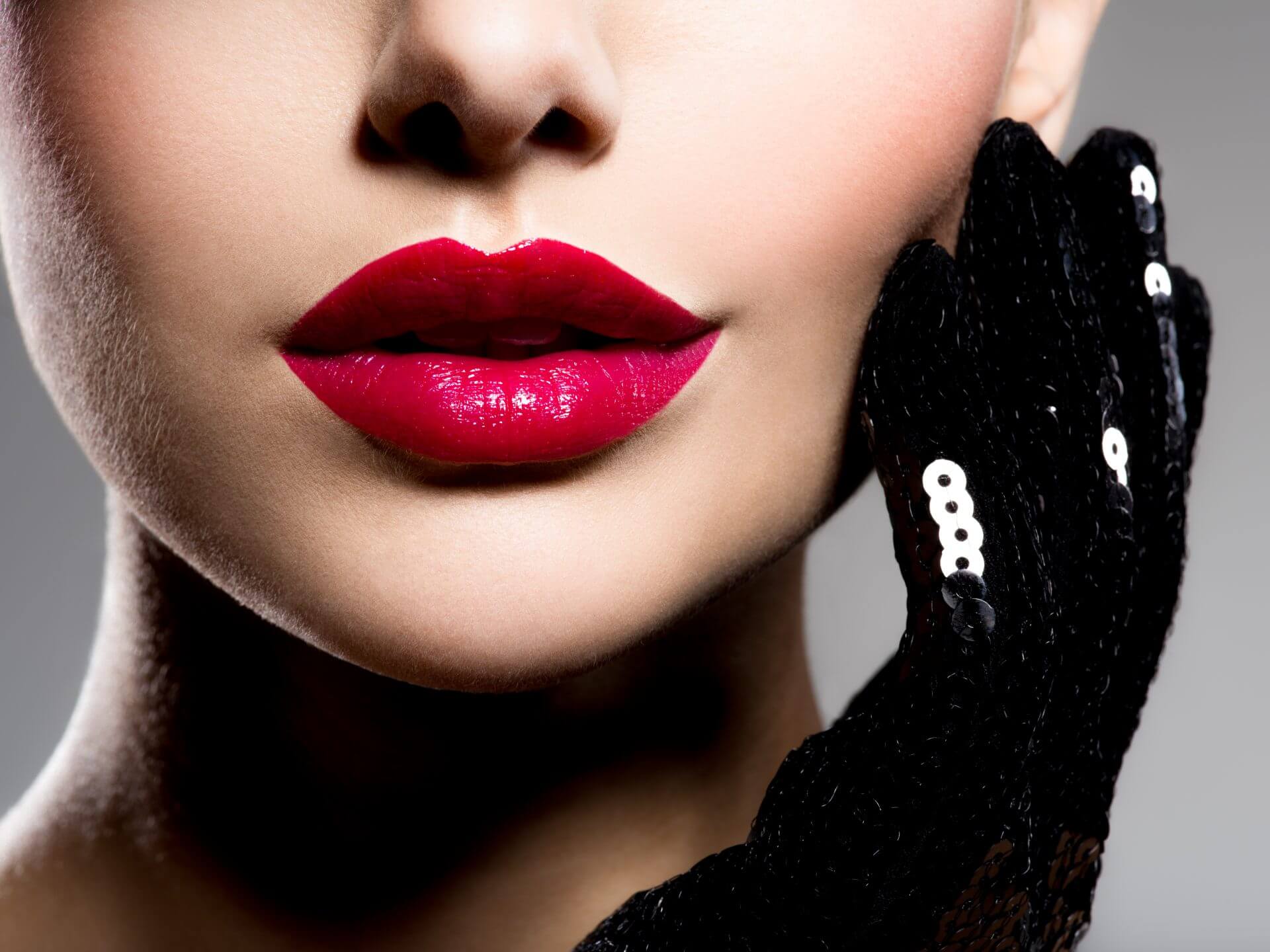 lose up women s lips with red lipstick black gloves cheek