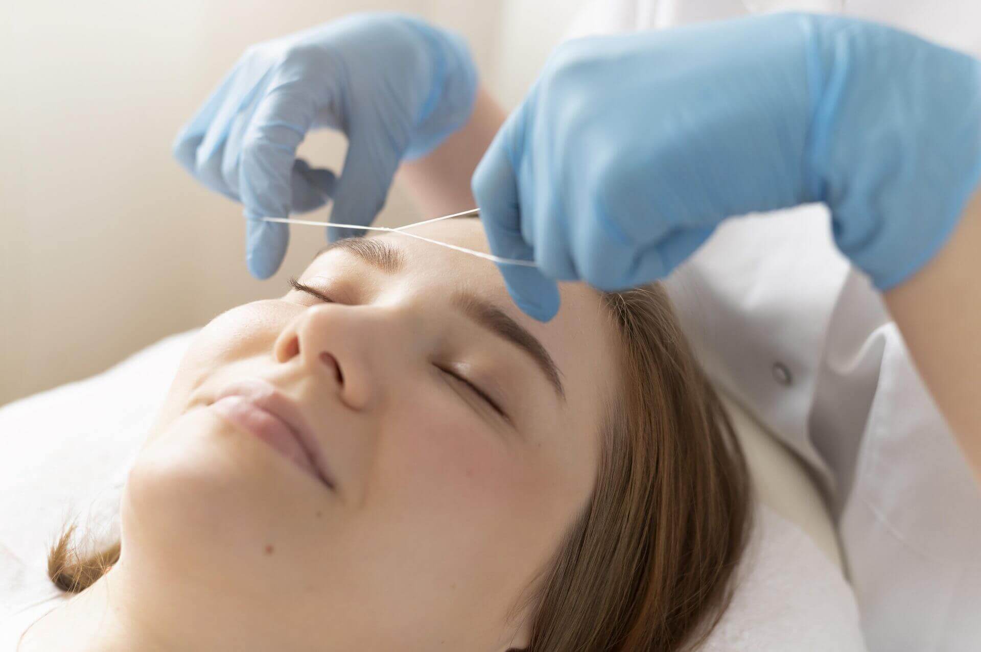 Close up of young woman receiving PDO thread lift