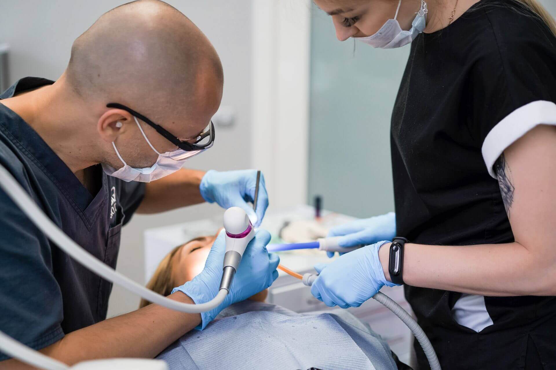 dentist performing surgery on gummy smile