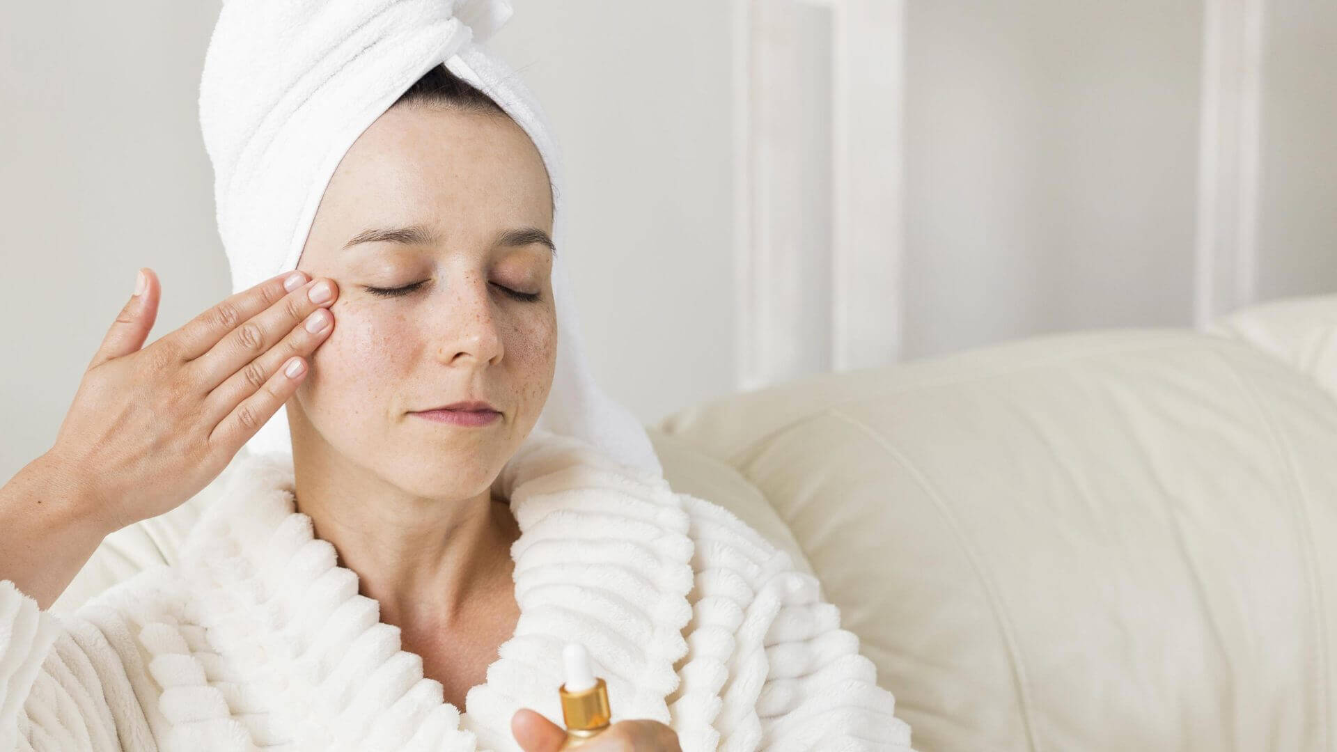 woman applying topical products