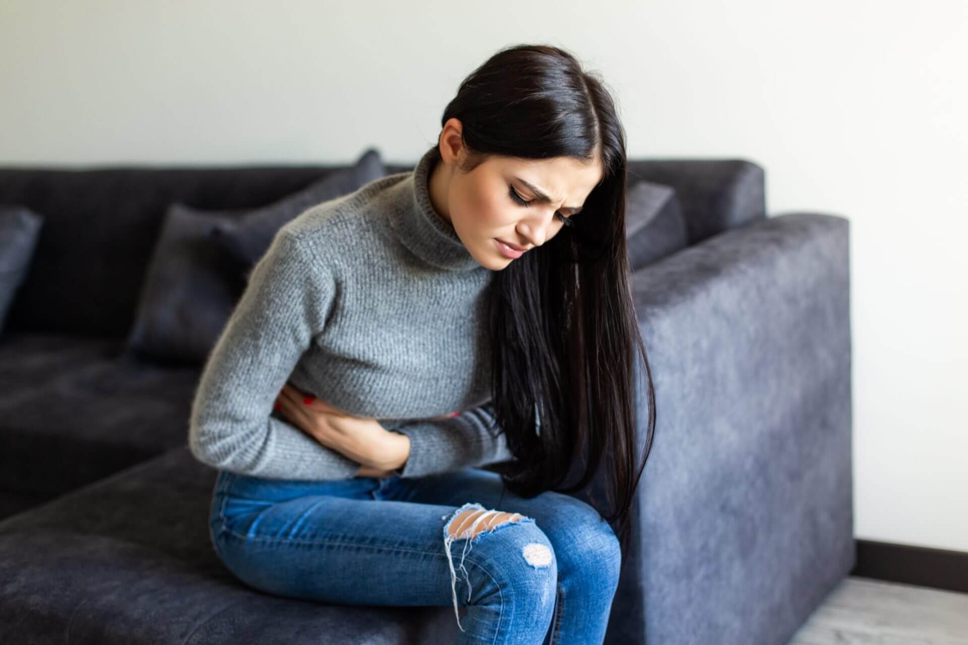 women having nausea symptoms